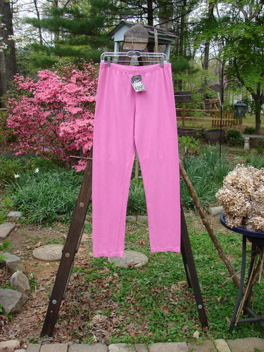 Barclay NWT Cotton Lycra Bally Layering Pant Legging Unpainted Peony Size 2: A pair of pink pants on a rack, perfect for layering.
