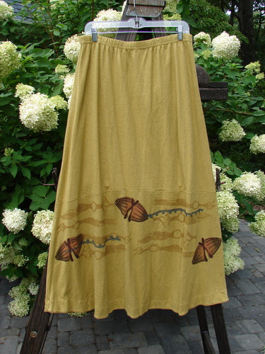 2000 Cotton Hemp Shade Skirt Bio Cell Gold Size 2: A lovely yellow skirt with a design on it. Elastic waistband, varying hemline, and adjustable loops for creative styling. Perfect condition.
