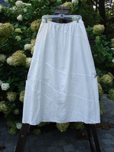 Barclay Linen Diagonal Skirt Unpainted White Size 2: A white skirt with diagonal stitchery, slightly shorter and boxier in length. Made from woven hemp and linen.