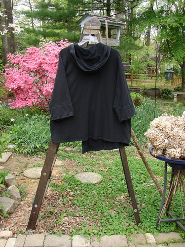 A black Barclay Interlock Single Button Hooded Jacket Grid, size 2, on a wooden stand.