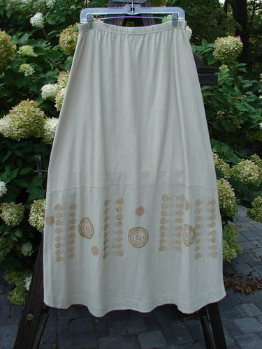 A 2000 Cotton Hemp Shade Skirt in Dove, size 2. Features include an elastic waistband, adjustable hemline, and creative adjustments. Measurements: Waist 30-52, Hips 52, Hem 70, Length 37.