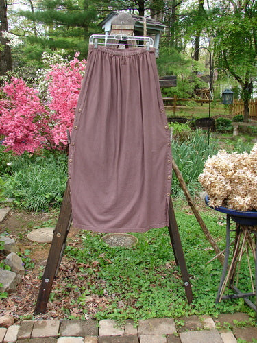 Image alt text: Barclay Button Panel Skirt on rack, featuring Harvest Theme painted panel, accent side buttons, and organic cotton fabric.