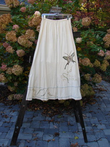 1998 Botanicals Sparrow Skirt with butterfly design in Queen Anne's Lace. Full elastic waist, exterior stitchery, and lower sectional panels. Made from organic cotton. Length: 38".