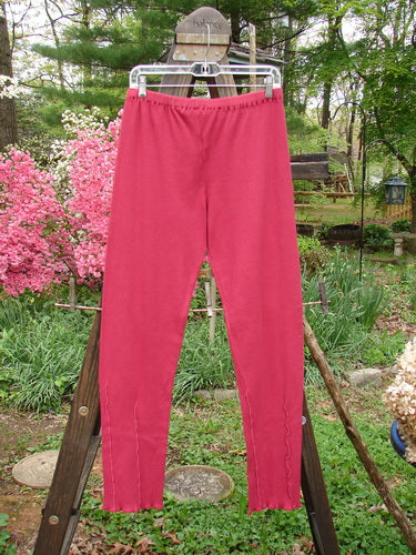Barclay Cotton Lycra Layering Pinch Rib Pant Legging Unpainted Cranberry Size 2: A pair of pants with a textured rib feel, featuring a pinch detail on the lowers.