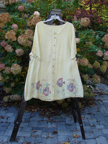 Barclay Linen Flower Button Gather Back Tunic Dress Undersea Plantain Size 2: A linen dress with a pearly button flower front, elastic drop waistline, and undersea fish theme.