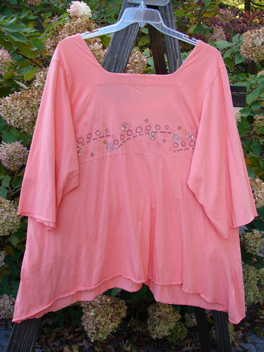 Image alt text: Barclay Be There Top with flower power design, empire waist seam, and full pleats. Size 2. Perfect condition. Organic cotton.