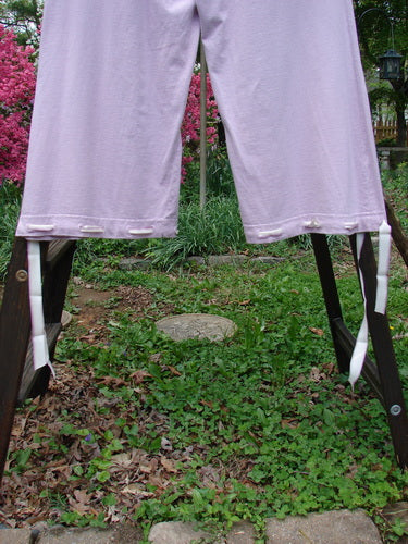 1999 Ribbon Pant Unpainted Orchid Size 1: Playful pants with elastic waistline, bubble cargo pockets, and silk ribbon cuffs. Sweeping and flared for a fun fish touch!