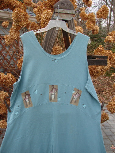 Image alt text: "1995 Zelda Jumper Dress with Triple Pagoda design, made from Medium Weight Eco Cotton, featuring a rounded deeper scooped neckline and a sweeping A-line shape. Versatile piece can be worn forward or back. Bust 48, Waist 50, Hips 58, Hem Circumference 105, Length 55 inches."