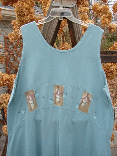 Image alt text: "1995 Zelda Jumper Dress with Triple Pagoda design, featuring a blue tank top with pictures on it, part of the Resort Collection. A versatile, everyday jumper made from medium weight eco cotton."