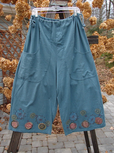 1993 Garden Pant with circle flower pattern, size 2. Cropped wide shape, corded side ties, deep pockets. Vintage Blue Fish Clothing.