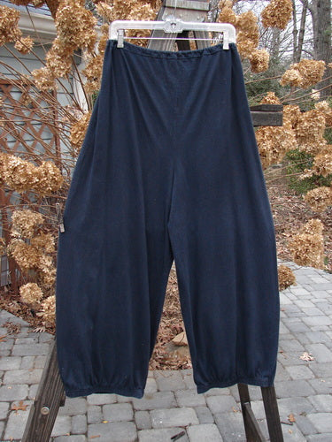A pair of Midnight Drawcord Pants from the 1994 Fall Collection. Made from Cotton Jersey, these pants feature a full drawstring waistline, tapered lowers with elastic gathers, and a generous hip measurement. Size 1.