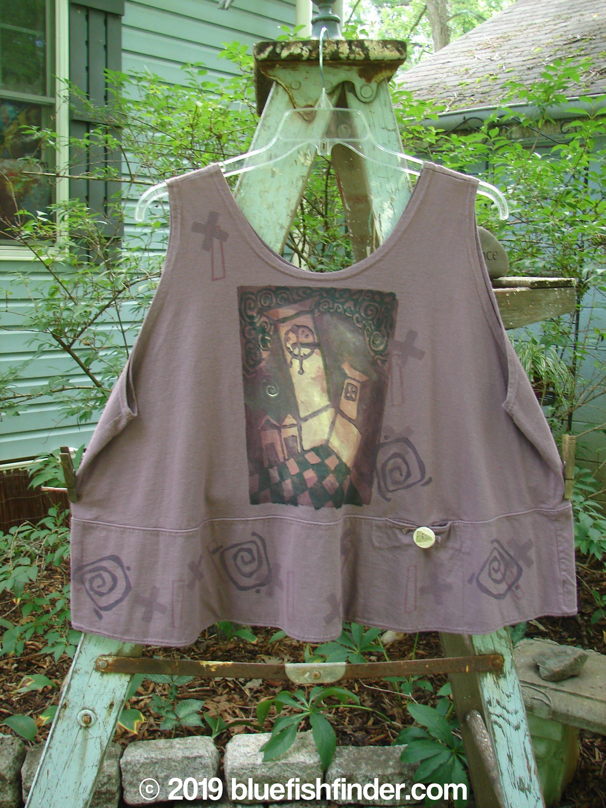 1995 Klee Button Top Cathedral Madder Lake Size 2: A swingy A-line crop shirt with a picture on it, featuring a sweet scooped neckline and a hand-stamped ceramic button.