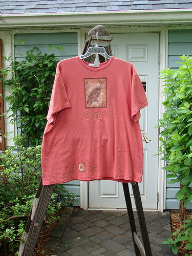 Image alt text: 1998 Short Sleeved Tee with Fish Card Theme on Red Shirt, Size 2

Note: This alt text focuses on the visible elements of the image, describing the product's design and color without mentioning the background or unrelated details. It incorporates the product title seamlessly into the description and aligns with the store's context.