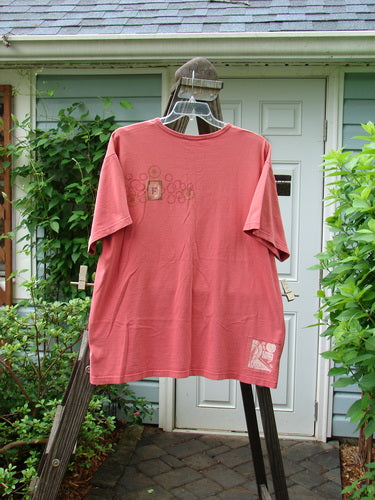 1998 Short Sleeved Tee Single Card Go Fish Cerise Size 2: A red shirt with a fish card theme paint design. Made from 100% organic cotton. Features drop shoulders, ribbed neckline, and a signature Blue Fish patch.