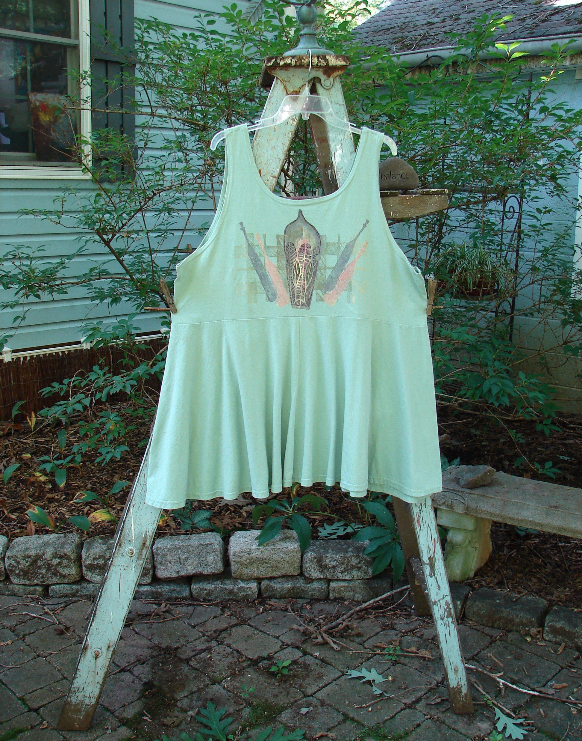 Image alt text: "1995 Patio Rose Dress Jumper Bottles in Dinette Green on a wooden ladder"