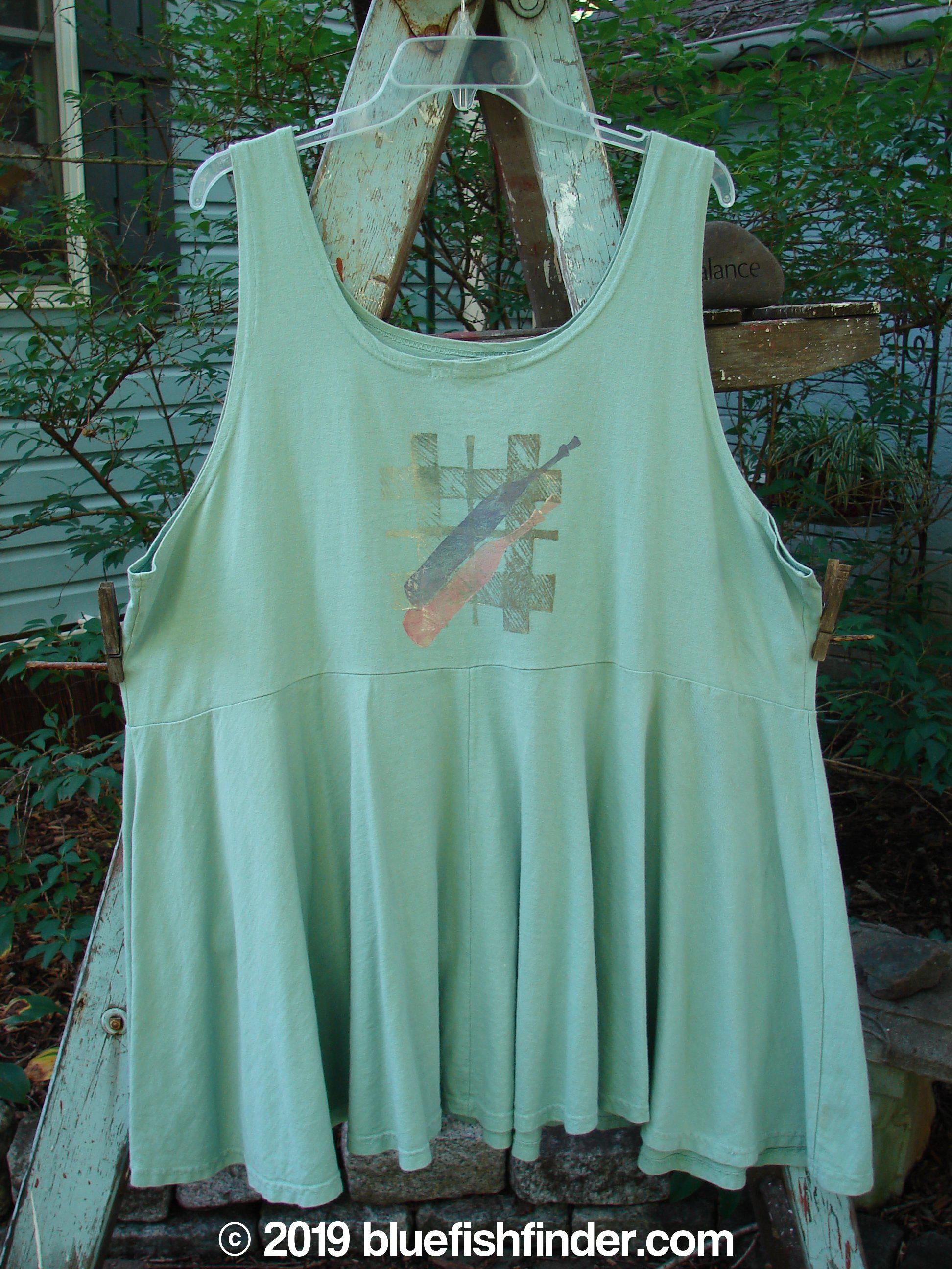 1995 Patio Rose Dress Jumper Bottles Dinette Green OSFA: A flouncy empire waist dress with a colorful bottle theme paint.