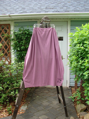 1997 Big Pocket Skirt with Single Flower Crocus design. Medium weight organic cotton. Drawstring waistline, bell-shaped bottom, and a super giant lower exterior pocket. Waist 26-52, hips 52, length 39 inches.