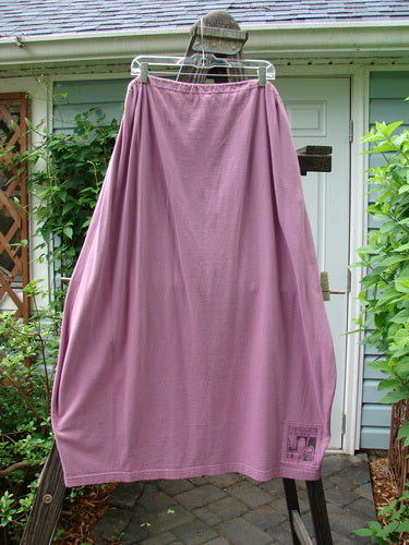 1997 Big Pocket Skirt with Draw String Waistline, Bell Shaped Bottom, and Giant Exterior Pocket. Features Single Flower Theme Paint and Huge Bottom Swing. Waist 26-52, Hips 52, Length 39 inches.