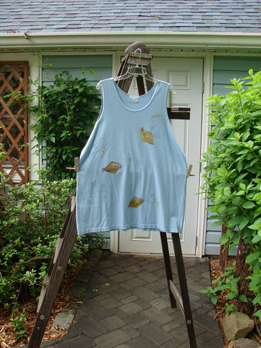 2000 Tank Top Fish Abstract Fish Water Size 2: A blue tank top with fish drawings on it, perfect for summer. Made from mid-weight organic cotton, it features deeper arm openings and a straighter longer shape. The fun abstract fish theme paint and signature Blue Fish patch add a unique touch. Bust 50, waist 50, hips 50, length 33 inches.