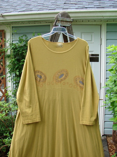 1999 Curved A Line Dress Rolling Gold Size 1: A yellow dress with a downward yoked waistline, deep side pockets, and a big lower swing. Made from organic cotton, it features a nicely rolled neckline and a handy drawcord back.
