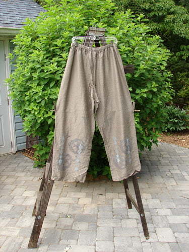 2000 NWT Shaunting Silk Drawcord Pant on clothes rack, wider hips and lowers, cement color, size 2