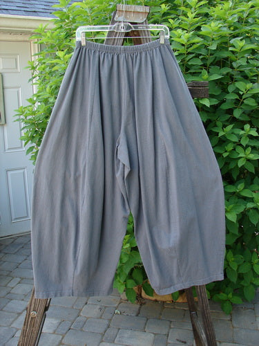 1997 Nuts and Bolts Pant Window Granite Size 1: A pair of pants on a clothesline, featuring painted pockets and a full elastic waistline. Perfect for keeping your little nuts, bolts, and trinkets!