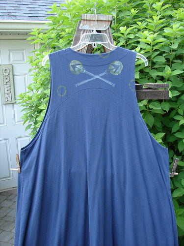 1996 State Fair Vest Directional Arrow Ridge Size 2: A blue dress with crossed swords logo, featuring a single oversized button, double paneled hemline, raised shoulder seam, and wide A-line shape.