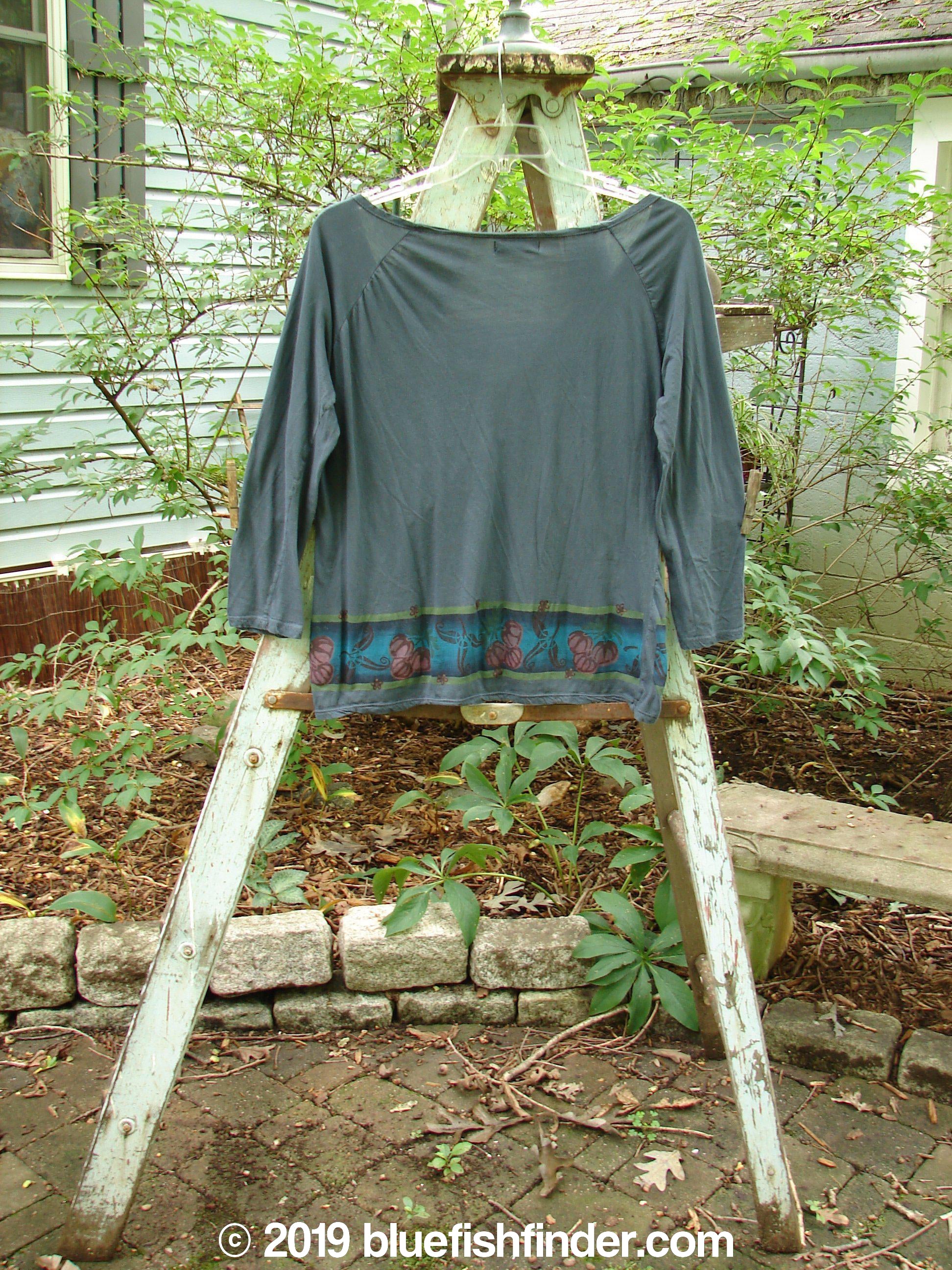 Barclay Batiste Decora Gather Top Gourd Farm Navy Size 1: A blue shirt with a unique adjustable drawcord accent and gentle vertical pleats on the shoulders.