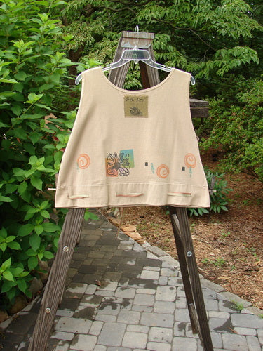 1992 Camisette top with fish design on wheat fabric, featuring a swingy hemline and blue fish patch.