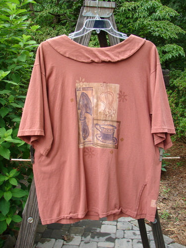 Image alt text: 1994 Compass Top Mixed Terra Size 2, a shirt with a picture on it, featuring an exaggerated sweet elongated collar, original vintage buttons, and a great garden creature theme paint.