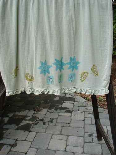 1991 Short Milkmaid Dress Sun Star Sage OSFA: A white cotton dress with blue flowers, laced neck hem, and dropped waistband.