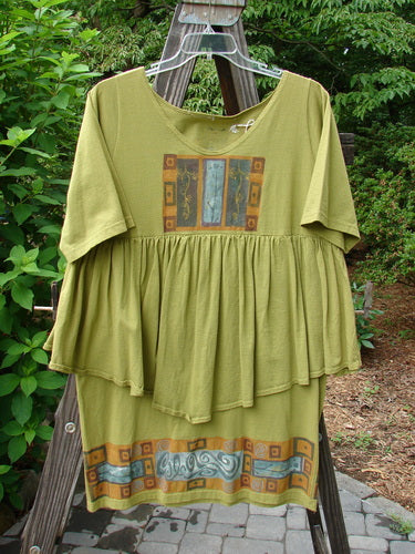 1993 NWT Picnic Dress: Green shirt with pattern, flounce, waist seam, shorter under piece, fall theme paint, vintage patch.