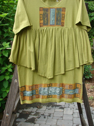1993 NWT Picnic Dress: Flirty green dress with pattern, V-neckline, continuous flounce, and vintage signature patch. Fits all sizes.