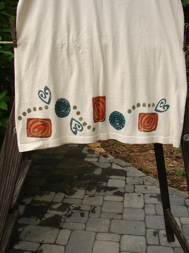 Image: A white towel with a design on it hanging on a rack. 

Alt text: 1993 Little Tank Dress Vase Tea Dye OSFA: White towel with a design on a rack.
