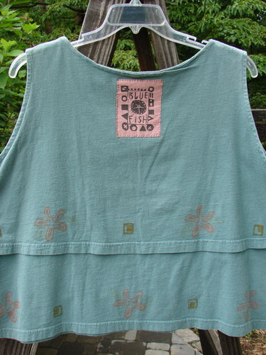 1993 Parallel Top Single Blossom Ocean OSFA: A blue shirt with a pink patch on it. Crop A Line Cut, seriously rounded neckline, double layered bodice, wider bottom layer. Swing City style!