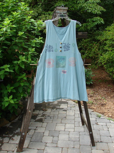 1994 Tuesday's Dress, a blue cotton dress with buttons, in perfect condition, from the Summer Collection. Features include an empire waistline, A-line shape, and the signature 94 Blue Fish stamp. Size: Small. Length: 35 inches."