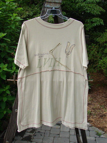 1998 Botanicals Snapdragon Top Echinacea Toadstool Size 2: A white shirt with a logo and graphic design on it, featuring a feminine flared shape, rounded neckline, and tall vented sides. Perfect condition, made from organic cotton. No pockets for a slim look.