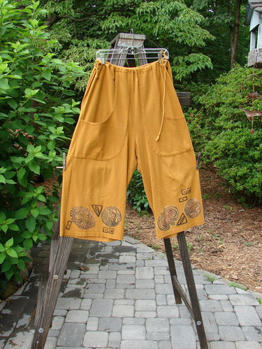 1993 Garden Pant Swirl Circle Oro Size 1: Cotton pants with side ties, deep pockets, and vintage swirl circle paint design.