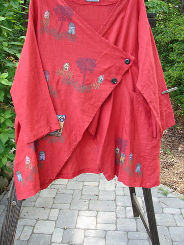 Barclay Cross Dye Linen Tidal Jacket Village Geisha's Robe Size 2: A red coat with a design on it, made from mid-weight linen. Features include a deeper neckline, double wrap side exterior pockets, and a varying front hemline.