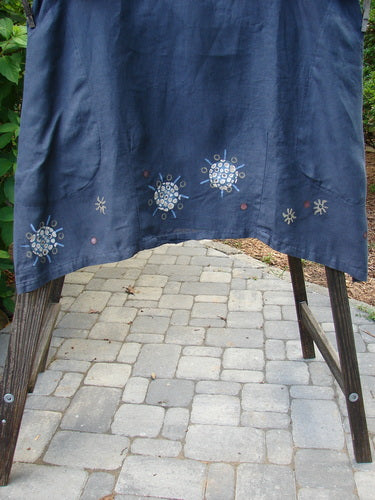 Image alt text: Barclay Linen Sailor Dress with celestial-themed paint, batiste adorned neckline, and drop front pockets, made from medium weight linen. Size 2.