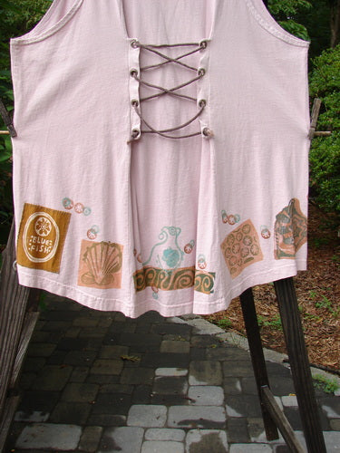 1993 Cha Cha Jumper: pink shirt with laces on a rack, lace up back, wooden post, seashell and swirl prints, A-line flare, empire waist seam, gathered bust area, Blue Fish patch.