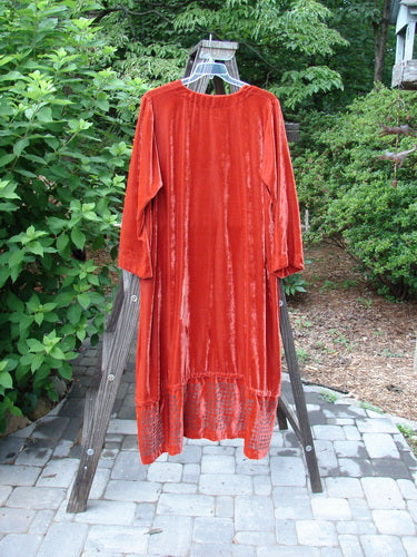 2000 NWT Silk Velvet Templeisen Gown Starlight Sienna Size 1: A red dress with a unique hemline, V neckline, and belled sleeves.