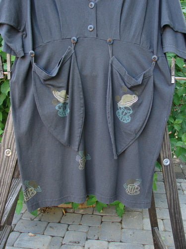 1994 Muse Dress Celestial Planet Blue Coal Size 1: A dress with tear drop pockets and celestial theme paint. 3/4 inch sleeves, V neckline, and empire waist seam.