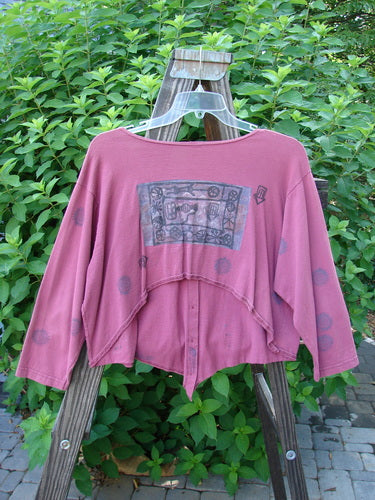 1994 Curve Shirt Studio Umeboshi Size 1: A pink shirt on a swinger, with a varying hemline and V-shaped neckline. Original Blue Fish buttons. A true collector's wonder!