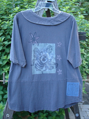 1994 Cross Collar Top Garden Bugs Blue Coal Size 1: A blue shirt with a bee on it, featuring a close-up of the bee and a blue label.