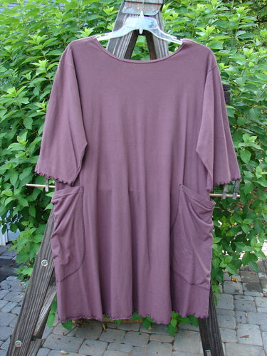 Barclay Curly Edge A Line Pocket Tunic Top Unpainted Raisin Size 1: A tunic top with a deeper rounded neckline, curled hemlines, drop shoulder, and oversized wrap-around side pockets. Made from light organic cotton.