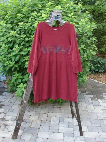 1999 Thermal Home Dress Farm Cinnamon Size 1: A red shirt with a design on it, featuring a squared off neckline and soft elbow patches.