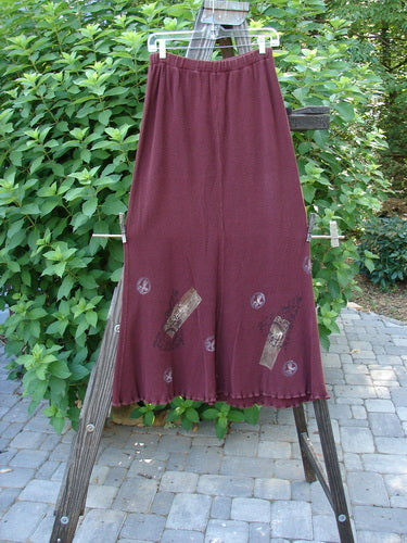 1996 Thermal Swirl Skirt Moon Cayenne Size 2: A long red skirt with an A-line flair, lettuce edging, and abstract theme paint.