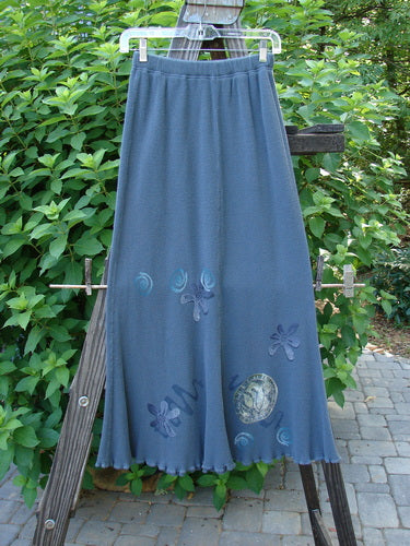 1996 Thermal Swirl Skirt Flower Mirror Size 0: A long blue skirt with a design on it, featuring a full elastic waistline and lettuce edging. Abstract theme paint and vertical sectional panels create a mermaid-like flair.