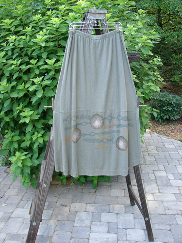 2000 Cotton Hemp Shade Skirt Biology Loden Size 2: A skirt on a stand, featuring a full elastic waistband and varying hemline. Perfect condition.